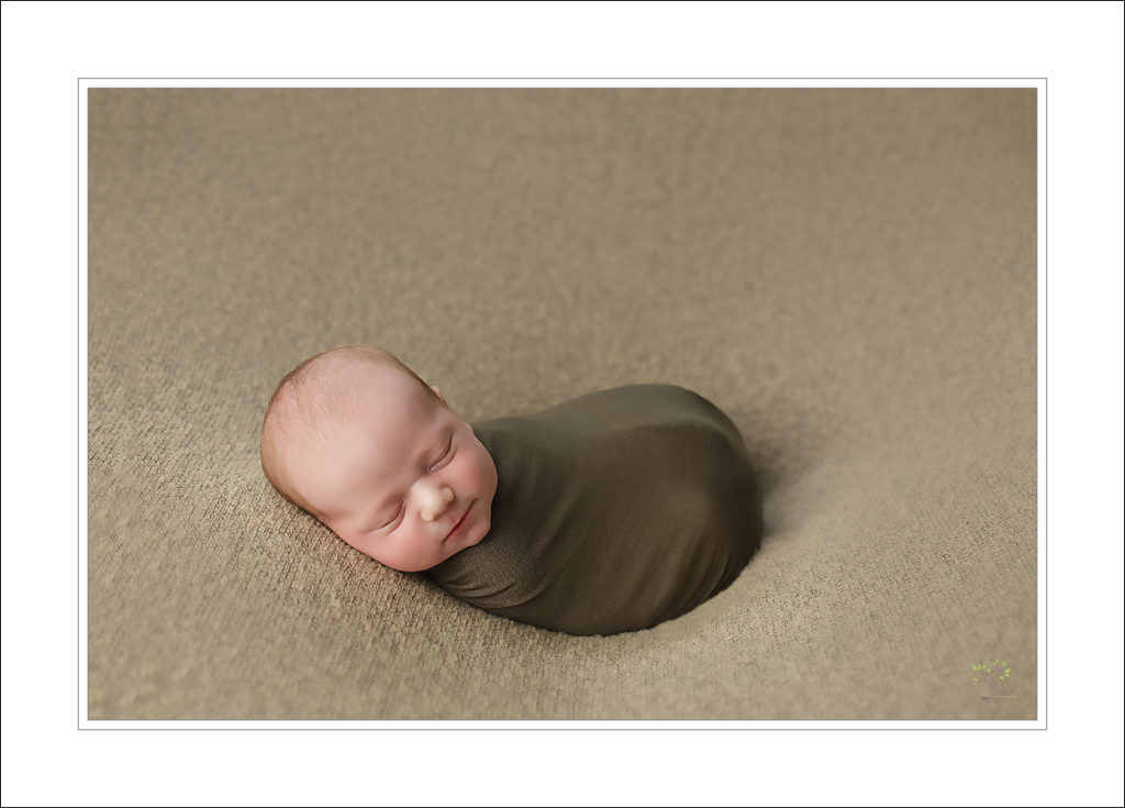 newborn baby posing